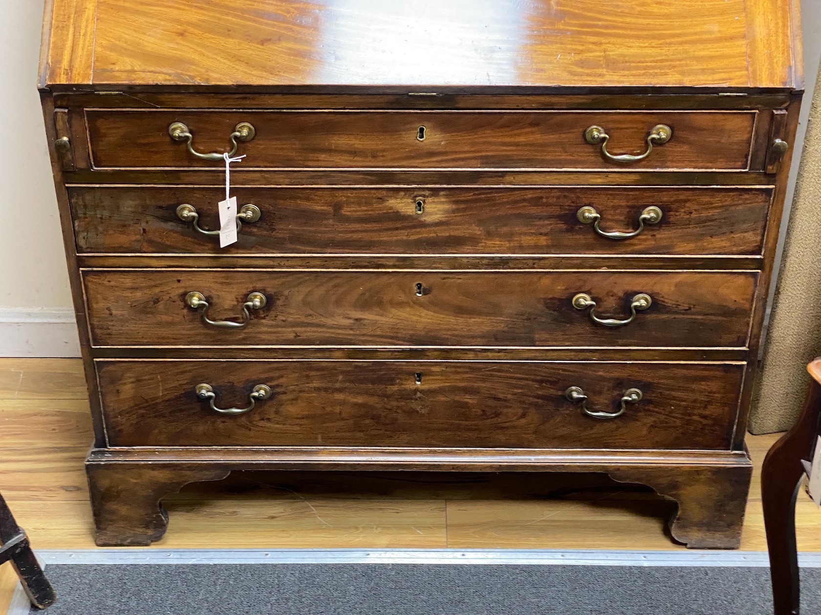 A George III mahogany bureau bookcase, width 106cm, depth 58cm, height 225cm